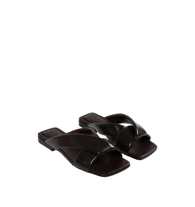 Image 2 of 4 - BLACK - BOTTEGA VENETA Riva Flat Mule featuring shiny calfskin with padded tubular straps and twisted design. Calfskin. Lining: lambskin. Made in Italy.