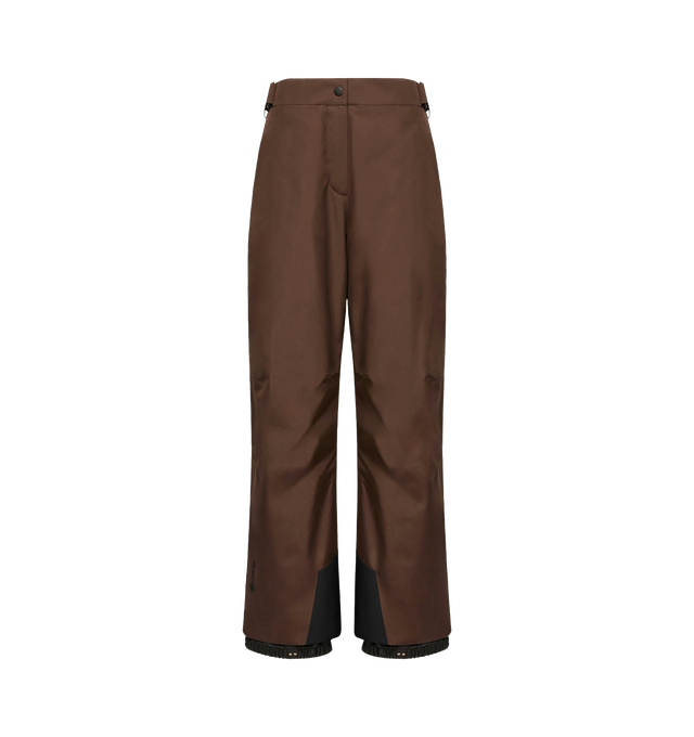 Image 1 of 1 - BROWN - Moncler Grenoble Women's GORE-TEX Laminate Insulated Ski Pants are crafted from 2L GORE-TEX laminate canvas and feature a high-performance silhouette designed for skiing and snowboarding. Engineered for protection in demanding mountain conditions, these insulated ski pants combine waterproof, windproof, and breathable performance with PrimaLoft Gold Active insulation and heat-sealed seams for enhanced warmth and weather resistance. Finished with an adjustable waistband and belt, RECCO