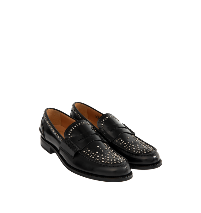 Image 2 of 4 - BLACK - CHURCH'S Pembrey Studded Leather Penny Loafers featuring polished calf leather, metallic stud detailing, round moc toe, notched vamp with keeper strap, slip-on style and rubber outsole. 20 mm flat heel. Made in Italy.