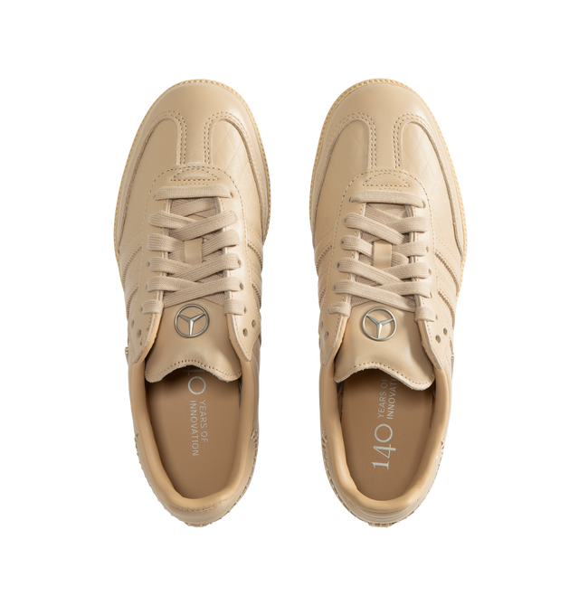 Image 5 of 5 - NEUTRAL - Adidas Men's Samba OG Mercedes-Benz Shoes are crafted from premium leather and feature the iconic Samba silhouette with signature Mercedes-Benz branding and serrated 3-Stripes. Designed with a smooth leather lining for enhanced comfort and a durable rubber outsole for everyday traction, this collaborative style blends heritage sport design with automotive-inspired detailing. Main Material: Premium Leather. Lining: Leather. Outsole: Rubber.