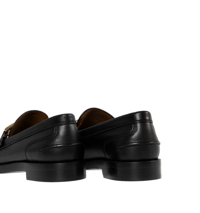 Image 3 of 4 - BLACK - Fendi Loafers with visible stitched apron and vamp embellished with FF motif. Made of 100% calf leather. Gold-finish metalware. Rubber sole. 25mm heel. Made in Italy. 