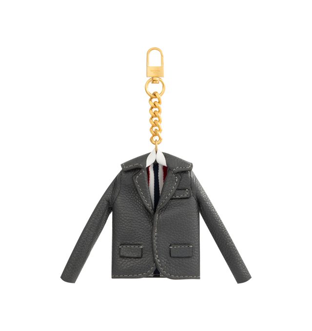 Image 1 of 2 - GREY - THOM BROWNE Classic Jacket Charm in Caviar Agneau featuring a soft lamb leather charm mirroring the brands classic jacket silhouette with notched lapels and flap pockets, and finished with signature striped lining with a loop chain and clasp fastening. Dimensions: L 7 x W 1 x H 7 cm. 100% Lamb Leather. Made in Italy.