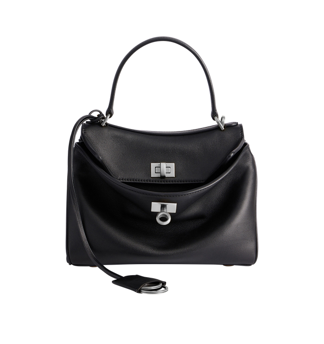 Image 1 of 5 - BLACK - BALENCIAGA Rodeo Handbag Mini featuring smooth calfskin, one handle hand carry, removable crossbody strap, removable cloche cls with two split rings, aged-silver hardware, turn lock closure, wide front pocket, 1 main compartment, 2 flat pockets at back, side snaps, 4 brass feet and nappa lambskin lining. 9" x 6.7" x 3.9". Calfskin. Made in Italy.