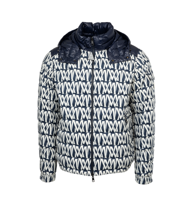 Image 1 of 5 - BLACK - MONCLER TABLASSES JACKET is a short puffer that features one monochrome, boudin-quilted face; while the smooth face boasts a graphic monogram print. The puffer is reversible and has enhanced with a detachable and adjustable hood. This jacket is crafted from polyester, polyester lining, down-filled, collar with snap button closure, reversible zipper closure, zipped pockets and sleeve pocket with snap button closure. EXTERIOR: 100% Polyester LINING: 100% Polyester HOOD LINING: 100% Poly 