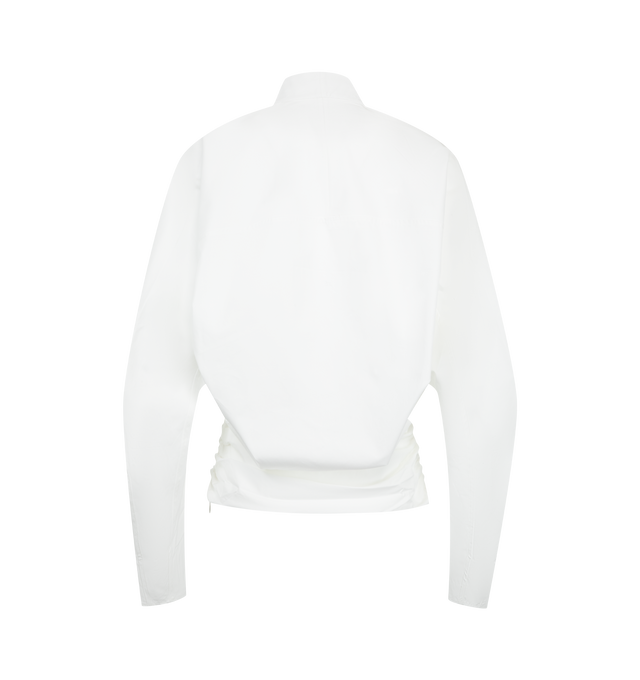 Image 2 of 2 - WHITE - Jacquemus Women's Draped Top is crafted from cotton poplin and features a fitted silhouette with draped detailing at the waist, a V-neckline, and long batwing sleeves with fitted cuffs. Finished with invisible zip closures at the cuffs and a side zip closure, this structured design balances volume and shape. Main Material: 100% Cotton. Made in Romania.