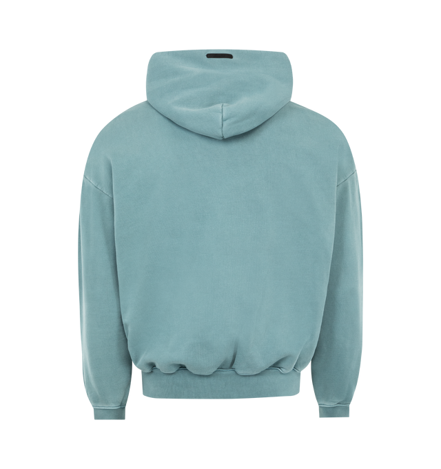 Image 2 of 3 - BLUE - FEAR OF GOD ESSENTIALS Campus 90s Hoodie 520GSM heavy fleece, pigment dyed, cropped, relaxed silhouette, exaggerated proportions with dropped shoulders for a relaxed drape, Essentials Fear of God campus puff-print graphic, side pockets, rib-knit cuffs, waist-hem and Fear of God Essentials label on the hood. 100% cotton.