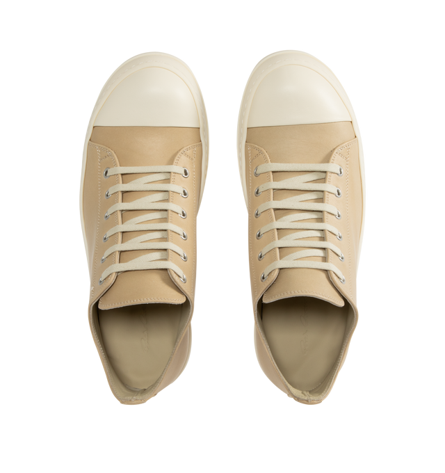Image 5 of 5 - NEUTRAL - Rick Owens Low Sneaks Sneakers featuring low-top, vegetable-tanned spalla leather, LWG-certified leather, calfskin cap toe, lace-up closure, eyelets at inner side, buffed calfskin lining and treaded rubber sole. Upper: leather. Sole: rubber. Made in Italy.