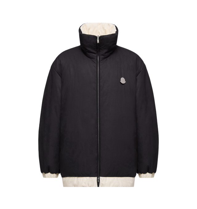 Image 1 of 1 - NAVY - MONCLER GENIUS X JIL SANDER Penguinone Reversible Short Down Jacket featuring cotton lining, down-filled, reversible, stand collar, zipper closure, adjustable cuffs and hem and detachable metal logo pin. 100% cotton. Padding: 90% down, 10% feather.