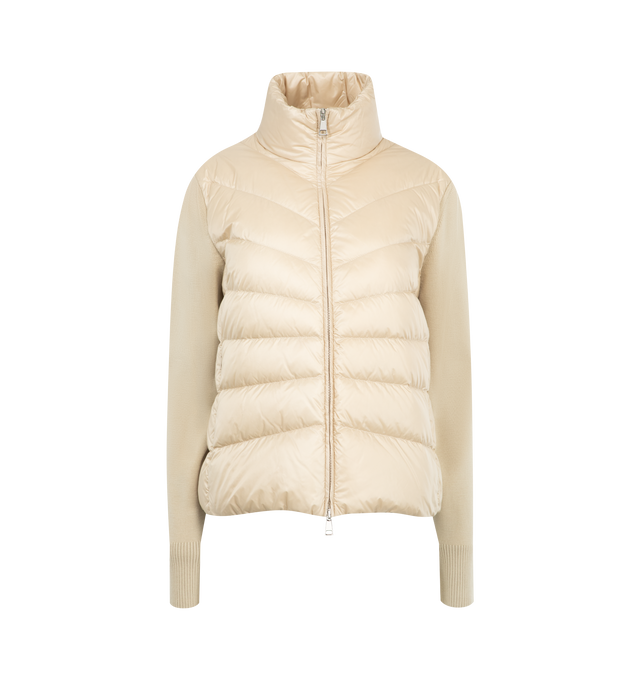 Image 1 of 3 - CHAMPAGNE - MONCLER Padded Cardigan featuring ultra-fine Merino wool, longue saison lining, down-filled longue saison front, rib knit sleeves, gauge 14, zipper closure, zipped pockets and logo patch. 100% polyamide/nylon. 100% virgin wool. Padding: 90% down, 10% feather.