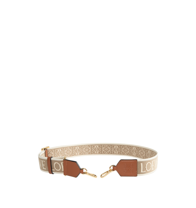 Image 1 of 2 - BROWN - LOEWE Anagram Strap featuring hook fastenings, 4cm wide, detachable and adjustable and embossed Anagram. 4 x 41.3 x 1.6 inches. Jacquard/Calf. Made in Spain. 