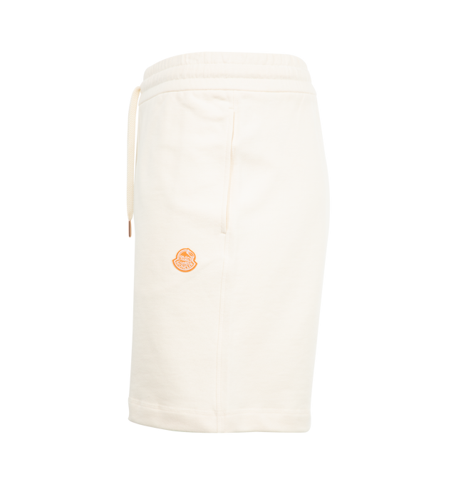 Image 3 of 3 - WHITE - Moncler x Gilga Farm Designed by Donald Glover Cotton Shorts reimagine the fruit of the orange groves on Donald Glover's Gilga Farm as a logo. The Moncler Genius bottoms are cut from 100% cotton fleece featuring waistband with drawstring fastening, side pockets, back patch pocket and logo patch. Made in Turkey.