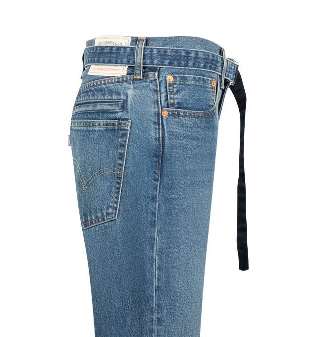 Image 3 of 5 - BLUE - Sacai X Levi's Women's Belted High-Rise Flare-Leg Jeans are crafted from a medium-wash cotton denim and feature a high-rise waist, flare-leg silhouette, a buckled belt, signature Levi back-pocket design, and utility-inspired patch pockets. Main Material: 100% Cotton. Made in Japan.
