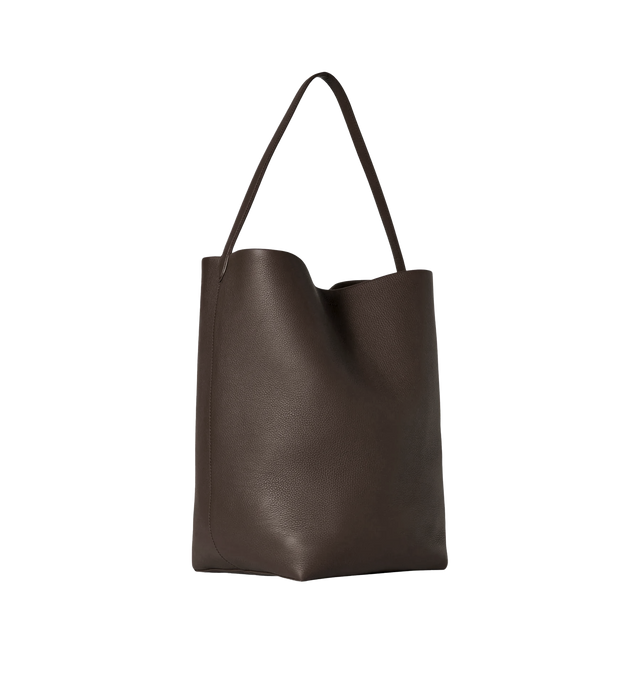 Image 2 of 3 - BROWN - THE ROW Large N/S Park Tote Bag featuring grained calfskin leather, interior toggle closure and flat handle. 15 x 17 x 8 in. 100% leather. Made in Italy.