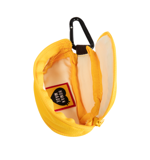Image 3 of 3 - YELLOW - Human Made Banana Pouch is crafted from thick cotton canvas and features a playful banana-shaped silhouette with a mini carabiner for easy attachment. Designed with a rubber-printed brand logo, a fruit sticker-style heart logo, and a double-zip closure that opens to reveal a banana peel-inspired interior. Main Material: 100% Cotton. Dimensions: 10 cm W x 4.5 cm H x 5 cm D. Fits: AirPods, keys, coins, lip balm, charging cables, and other small essentials.