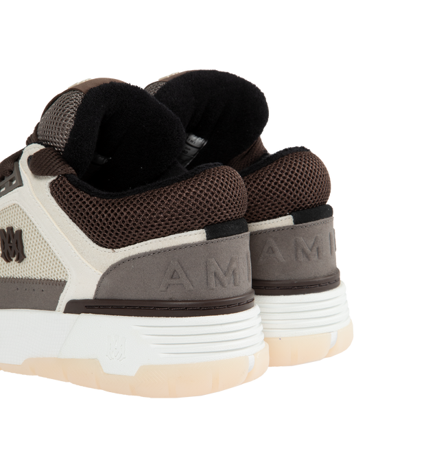 Image 5 of 5 - BROWN - AMIRI MA-1 Platform Skate Sneakers featuring platform heel, round toe, star-shaped perforations, chunky lace-up vamp, branded label at the tongue, padded collar and tongue, MA monogram on the side and rubber outsole. 