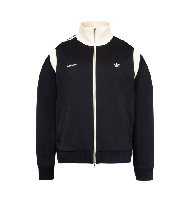 Image 1 of 3 - NAVY - ADIDAS X WALES BONNER Twill Track Top featuring funnel neck, full-zip closure, long sleeves with ribbed cuffs, stripes at shoulders, logos at left and right chest, two side hand pockets and ribbed hem. 57% polyamide, 39% cotton, 4% spandex. Lining: 100% cotton.
