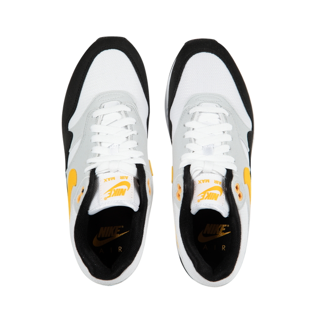 Image 5 of 5 - WHITE - NIKE Air Max 1 featuring premium upper, low-cut collar, full-length Polyurethane (PU) midsole, visible Max Air heel unit and solid rubber waffle outsole. 