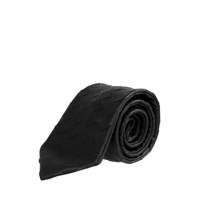 Image 1 of 2 - BLACK - Intrecciato Leather Tie featuring tie made with Intrecciato craftsmanship in soft leather. Length: 59. Width: 1.6. 100% lambskin. Made in Italy.