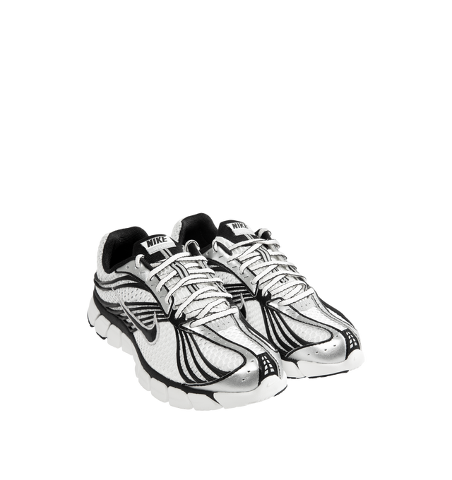 Image 2 of 5 - WHITE - Nike Men's Zoom Skylon 11 Shoes revive the late-2000s performance runner with an aerodynamic silhouette and advanced cushioning technology. Designed for comfort and everyday wear, this retro-inspired style features a chunky Air Zoom midsole with deep flex grooves and exposed cushioning pods that deliver a balanced combination of responsiveness, flexibility, and impact absorption. Materials: Textile & Synthetic upper. Midsole: Air Zoom Cushioning.