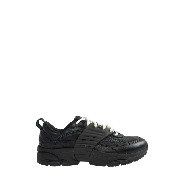 Image 1 of 5 - BLACK - Men's Jordan Trunner O/S SP Sneakers feature a leather upper with synthetic overlays, molded midfoot support wings, and signature Jordan branding for a modern athletic look. These lifestyle sneakers combine responsive Cushlon 3.0 foam cushioning, a lightweight foam midsole, and a durable rubber outsole for exceptional comfort, stability, and everyday traction. Main Material: Leather and Synthetic. Midsole: Foam with Cushlon 3.0 Cushioning. Sole: Rubber.