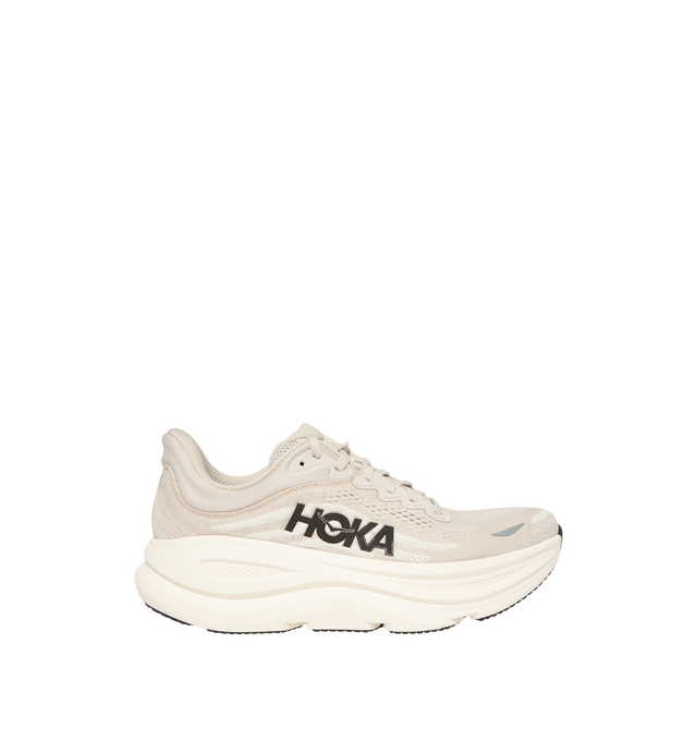Image 1 of 5 - NEUTRAL - Hoka M Bondi 9 Sneaker featuring engineered mesh upper with rubber sole, lace-up front, foamed EVA midsole and increased stack height for maximum cushioning, zonal breathability, reflective detailing and cushioned tongue and collar.