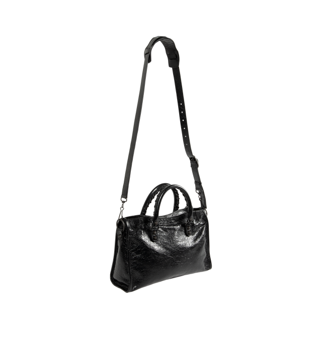 Image 2 of 3 - BLACK - Balenciaga Women's Le City Small Bag is crafted from supple leather and features the house's iconic slouchy silhouette with rolled top handles, signature buckle detailing, and an adjustable, detachable shoulder strap for versatile styling. Designed with a spacious zip-top main compartment, this designer handbag blends Balenciaga's archival motorcycle-inspired aesthetic with everyday functionality. Main Material: Leather. Dimensions: 30 x 19 x 10 cm. Made in Italy.