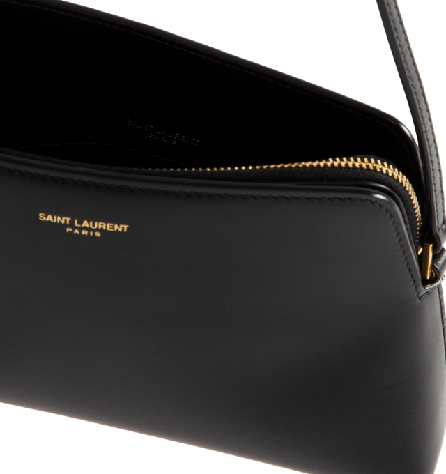 Image 3 of 3 - BLACK - SAINT LAURENT Mini Bag featuring slightly shiny calfskin, embossed with the SAINT LAURENT PARIS signature, adjustable strap for bespoke shoulder carry, leather lining, bronze-toned hardware, zip closure, three main compartments and one card slot. 8.3" x 4.3" x 2.6". Strap drop: 7.9". Calfskin. Made in Italy.