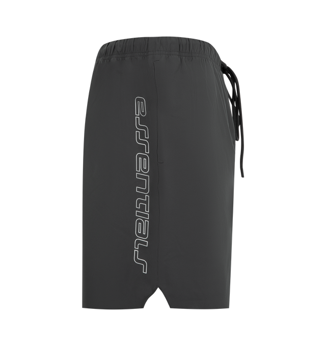 Image 3 of 3 - BLACK - FEAR OF GOD ESSENTIALS Tech Nylon Classic Short featuring a tech nylon-spandex blend, the leg is finished with a metallic 3M-printed Essentials logo, encased elastic waistband with elongated drawcords, side seam pockets and a Fear of God Essentials rubberized label stitched at the center front. 16% spandex, 84% nylon.
