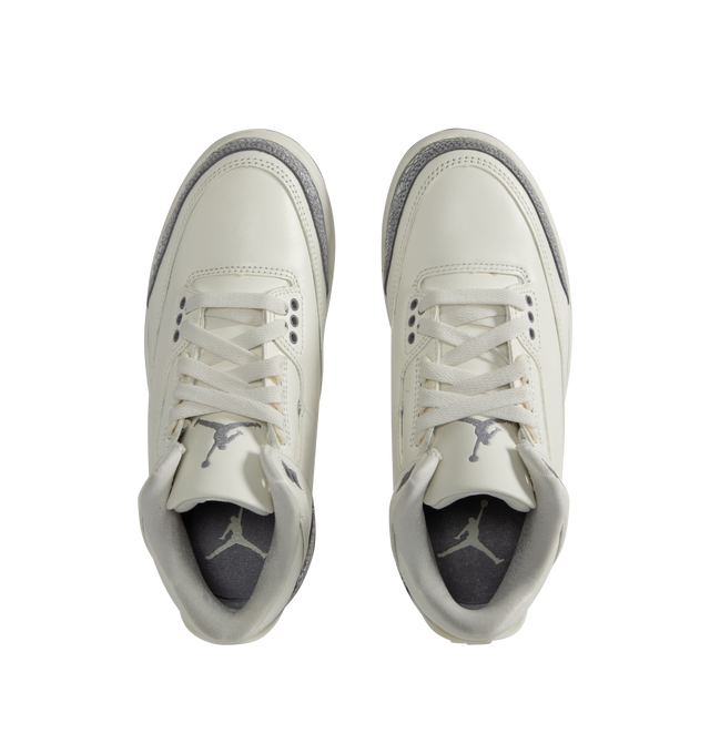 Image 5 of 5 - WHITE - JORDAN Air Jordan 3 Retro Sneaker featuring leather upper with rubber sole, lace-up front, embroidered Jumpman logo at padded tongue, padded collar with TPU pull-tab and debossed Jumpman logo at back counter.