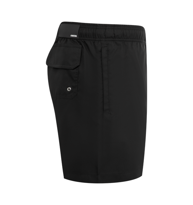 Image 4 of 4 - BLACK - AMIRI Club Amiri Swim Trunk featuring logo on leg, elastic waistband with drawstring, side seam pockets and back pocket with flap. 100% polyester.