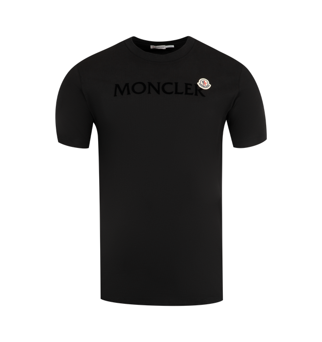 Image 1 of 2 - BLACK - MONCLER Logo Tee featuring GOTS-certified cotton jersey, short sleeves, flocked logo print and logo patch. 100% cotton.