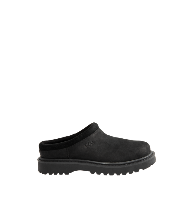 Image 1 of 4 - BLACK - UGG Men's Birch Clog II is crafted from premium suede and features a slip-on clog silhouette with a soft lining and cushioned footbed for exceptional everyday comfort. These designer clogs combine UGG's signature cozy feel with durable construction, making them a versatile choice for both indoor and outdoor wear. Main Material: Suede. Lining: Soft Textile. Sole: Rubber.