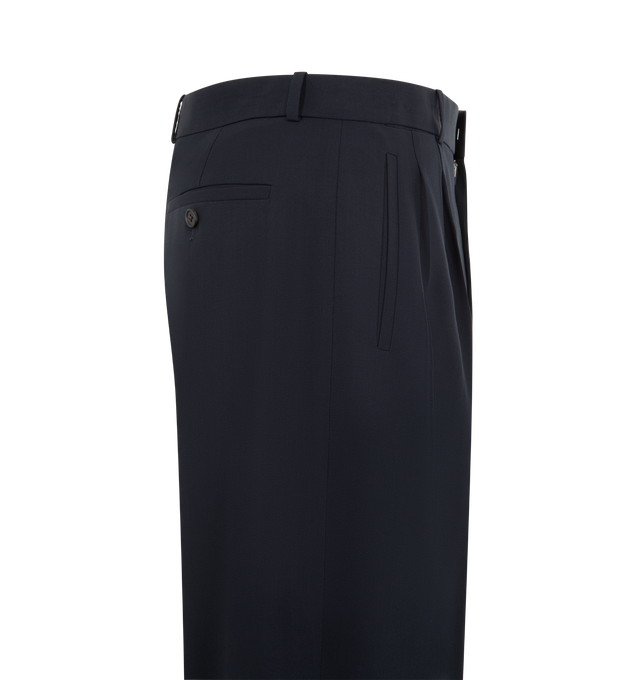 Image 3 of 3 - NAVY - THE ROW Tarek Pant featuring mid-rise tailored trousers in virgin wool with a straight leg, front double pleats and side welt pockets. 100% virgin wool. Made in Italy.