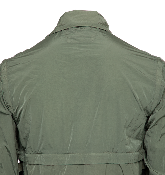 Image 6 of 7 - GREEN - C.P. COMPANY Chrome-R Goggle Utility Jacket featuring acetate lenses with press-stud fastening at detachable hood, bungee-style drawstring at hood and hem, two-way zip closure wit press-stud placket, flap pockets, seam pockets and adjustable press-stud fastening at cuffs. 100% recycled polyamide. Lining: 100% cotton. Made in China. 