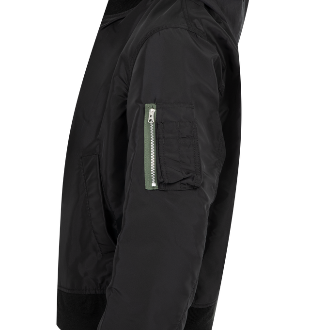 Image 3 of 3 - BLACK - SACAI Nylon Twill x Grosgrain Blouson featuring paneled bomber jacket, dual-layer design, ribbed collar, hem, and cuffs, grosgrain tape accents, front zip closure, utility-inspired flap and zip pockets and a drawstring hood. Made in Japan.