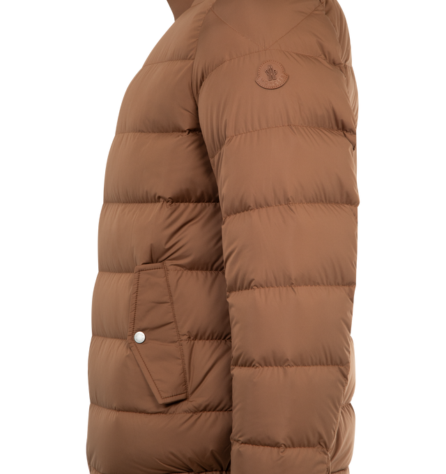 Image 3 of 3 - BROWN - MONCLER Phrier Short Down Jacket featuring Airsoft lining, down-filled, collar with rib knit lining, zipper closure, flap pockets with snap button closure, inner pockets with zipper and snap button closure, adjustable cuffs and leather logo patch. 100% polyester. Padding: 90% down, 10% feather. Made in Italy.