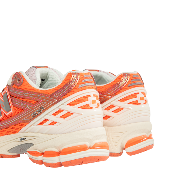 Image 3 of 5 - ORANGE - NEW BALANCE 1906R Sneakers featuring mesh upper with synthetic overlays, ACTEVA LITE midsole cushioning, ABZORB SBS heel cushioning, N-ergy outsole provides superior shock absorption, Stability Web outsole technology provides added arch support, TPU heel cage, rubber sole and adjustable lace closure.
