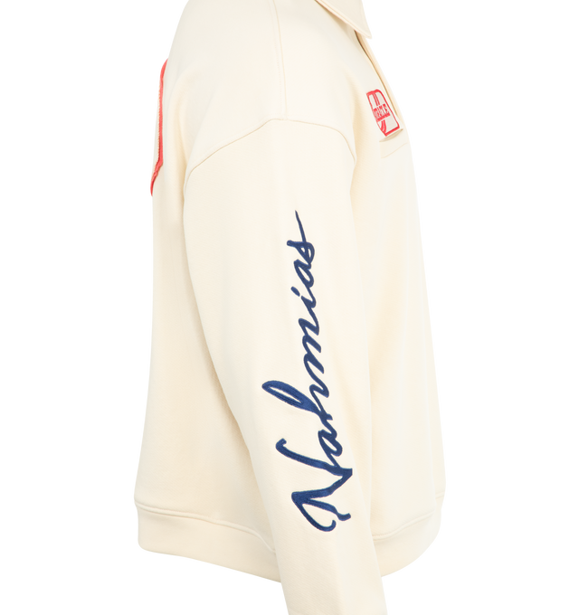 Image 4 of 4 - WHITE - NAHMIAS Polo Henley Shirt featuring long sleeves, half button collar, novelty patches at front chest and sleeves, logo embroidery on sleeve and ribbed cuffs and hem. 100% cotton.