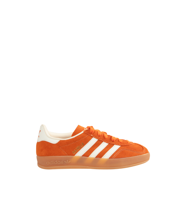 Image 1 of 5 - ORANGE - Adidas Gazelle Indoor Sneakers are a lace-up style with suede uppers and gum outsoles. Textile linings. Unisex style in men's sizes.