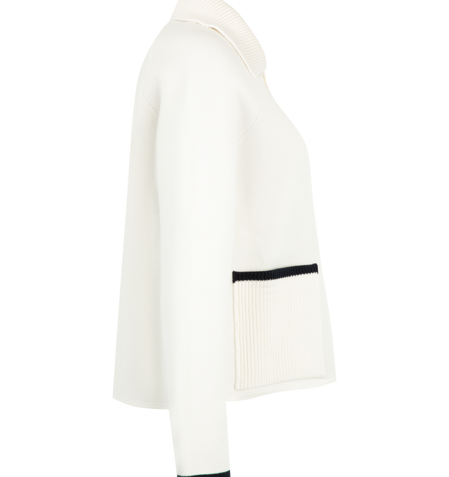Image 3 of 3 - WHITE - Thom Browne Womens Double-Face Piqu Stitch Polo Collar Jacket is crafted from a virgin wool and cotton blend double-face piqu knit and features a rib-knit polo collar, front button closure, raglan sleeves, rib-knit patch pockets with contrast tipping, rib-knit cuffs and hem, signature 4-bar detailing, internal RWB grosgrain trim, and the signature striped grosgrain loop tab. Main Material: 50% Virgin Wool, 47% Cotton, 3% Polyamide. Made in Italy.