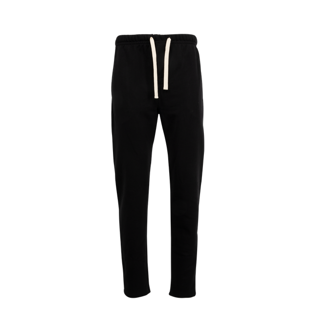 Image 1 of 3 - BLACK - MERZ B. SCHWANEN Loopwheeled Sweatpants Heavy featuring narrow tapered leg, slit with button facing, form-stable waistband made of ribbed fabric at the bottom, heavy, grippy and slightly irregular surface structure, side pockets, patch back pocket, integrated front slit with fabric underlap, genuine mother-of-pearl buttons and drawstring with natural cotton ribbon. 100% cotton. Made in Germany.