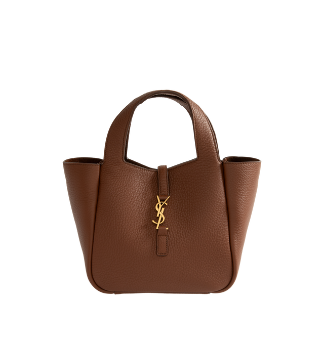 Image 1 of 3 - BROWN - Saint Laurent Women's LE 5 7 Baby Bea Bag is crafted from grained deerskin leather and features a compact version of the house's iconic LE 5 7 Bea silhouette. Designed with a signature YSL 'CASSANDRE' hook closure, top handle, and an adjustable, detachable crossbody strap, this versatile style can be carried by hand or worn crossbody. The interior is lined in tonal suede and finished with bronze-tone brass hardware. Main Material: Deerskin Leather. Lining: Suede. Hardware: Bronze-To