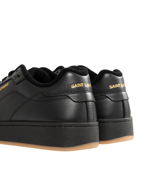Image 3 of 5 - BLACK - SAINT LAURENT SL61 Sneaker featuring low-top, lace up closure, a gold-tone logo signature on the side and back heel counter, signature patch on the tongue and rubber sole. Calfskin. Made in Italy.