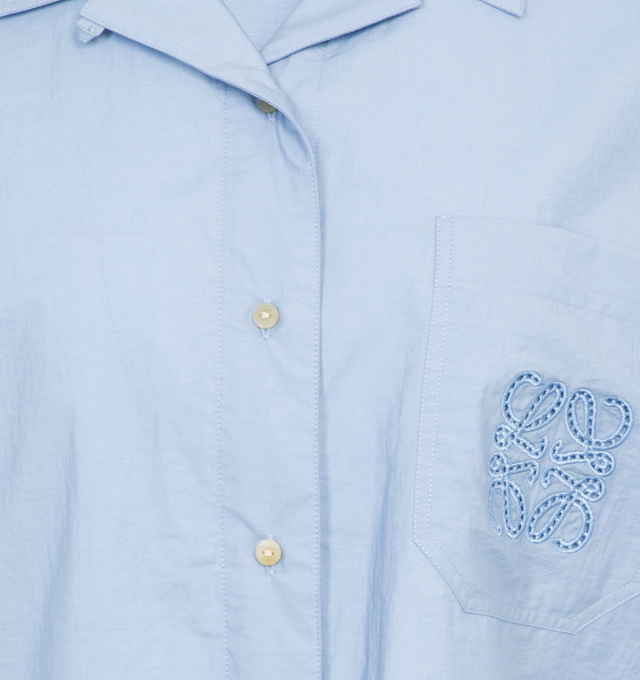 Image 3 of 3 - BLUE - LOEWE PAULA'S IBIZA Cropped Shirt featuring lightweight textured cotton poplin, relaxed fit, cropped length, classic collar, short sleeves, button front fastening, chest patch pocket and Anagram ajour embroidery placed on the chest pocket. Cotton/polyamide. Made in Portugal. 