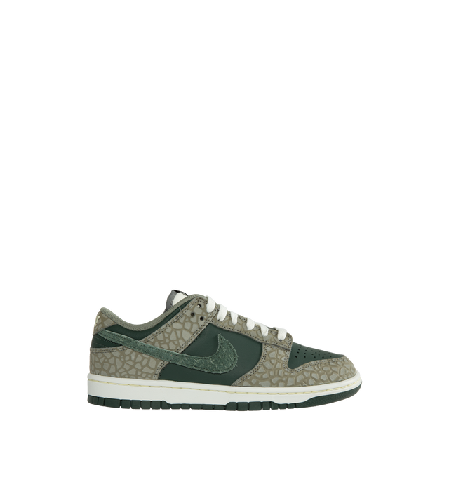 Image 1 of 5 - GREEN - NIKE Dunk Low Retro Premium featuring padded, low-cut collar, aged upper, foam midsole and rubber outsole with classic hoops pivot circle.