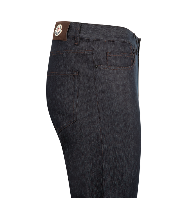 Image 3 of 3 - NAVY - MONCLER Straight Leg Denim Jeans featuring comfort denim, zipper and snap button closure and logo patch. 75% cotton, 24% polyester, 1% elastane/spandex.