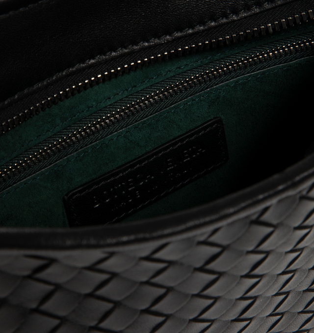 Image 3 of 3 - BLACK - BOTTEGA VENETA Small Veneto Bag featuring cross-body bag with rounded shape, intrecciato nappa leather fluffy, one interior zipped pocket and zipper closure. 6.7" x 10.6" x 1". Lambskin. Made in Italy.