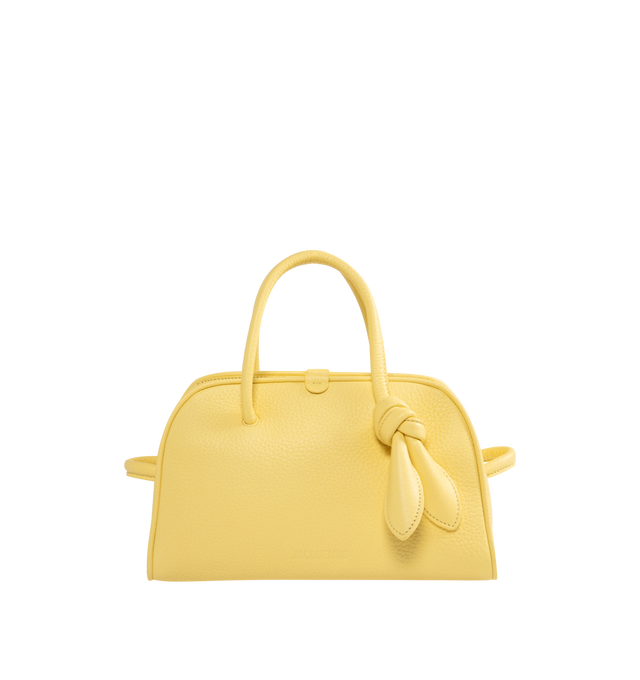 Image 1 of 3 - YELLOW - JACQUEMUS Turismo Small Bag featuring small soft bowling bag, gained leather, two-way zip closure, inside pocket, detachable and adjustable shoulder strap and bow detail. 26 cm x 16 cm x 11 cm. 100% calfskin. Made in Italy.