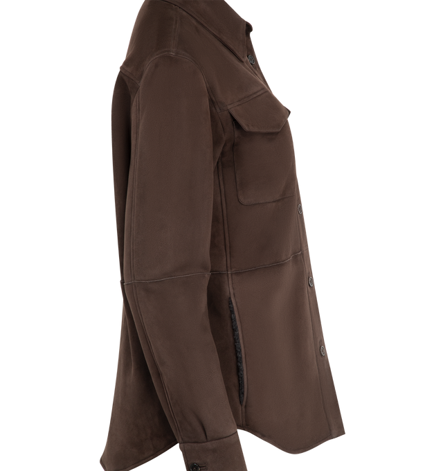 Image 3 of 3 - BROWN - The Row Relaxed shirt jacket in supple lambskin shearling with front patch pockets, paneled construction, and front button placket with horn button closure. 100% Lambskin Leather. Made in Italy.