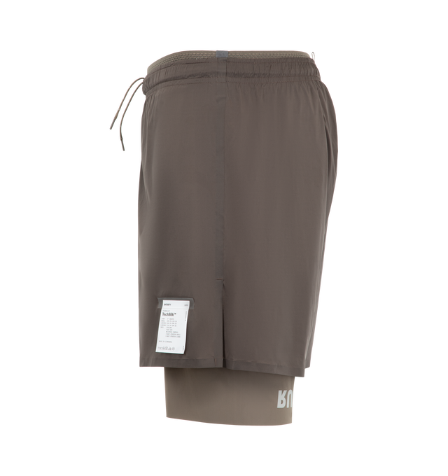 Image 3 of 3 - BROWN - Satisfy Men's TechSilk 8" Shorts are crafted from lightweight French-engineered TechSilk and feature a 5-inch shell paired with an 8-inch Justice TechSilk Evo liner. Designed for long-distance performance, the fast-drying construction is enhanced with Coldblack treatment for cooling, odor control, UV protection, and four-way stretch. Functional details include a sweat-resistant hidden phone pocket, double waistband with internal drawcords, a mini S-Carabiner for keys, and reflective
